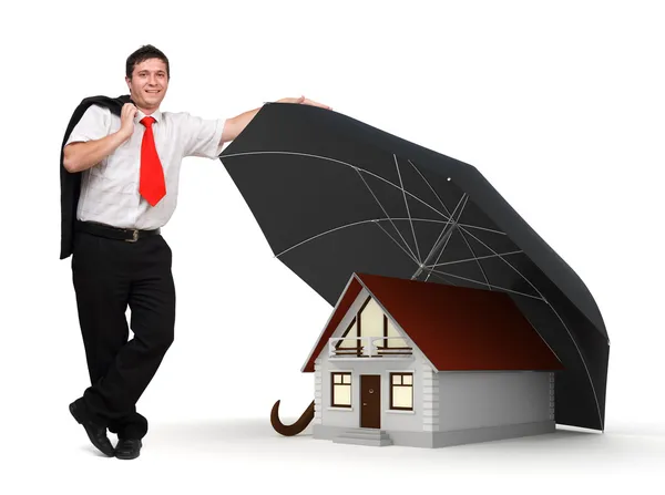 Hus försäkring - affärsman - paraply — Stockfoto