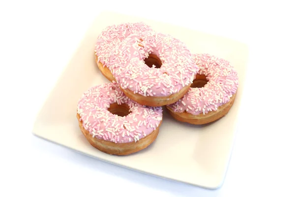 sprinkles ile dört buzlu çörek