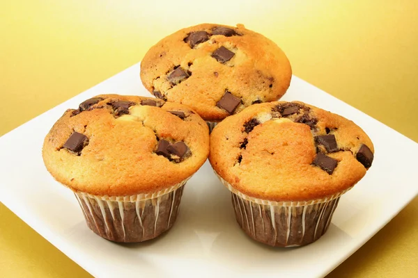 stock image Three choc chip muffins