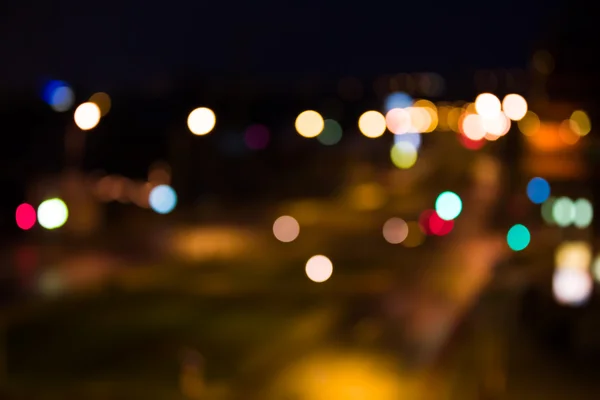 stock image Blurred road with city lights at night