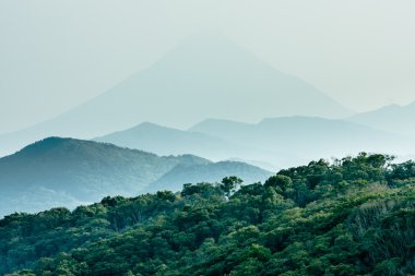 Layered hills with Mount Kaimon (Kaimondake) clipart