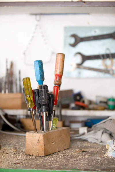 Set of used screwdrivers in workshop — Stock Photo, Image