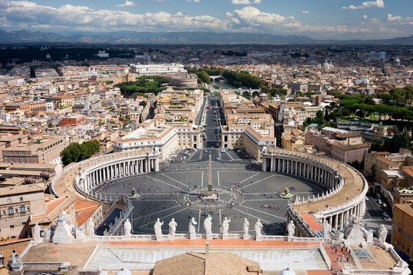 View from the St. Peter's Basilica. The Vatican is sunlit, whereas the Rome part is covered by clouds.