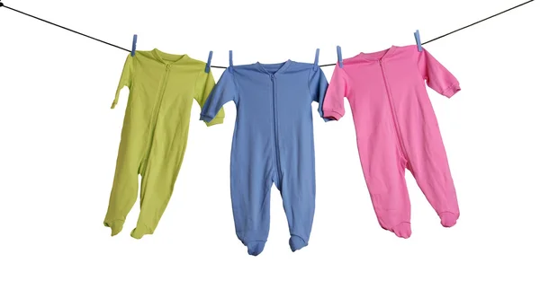 Baby pražce na prádelní šňůru. — Stock fotografie