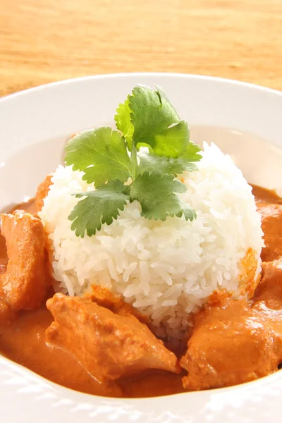 stock image Butter chicken over rice