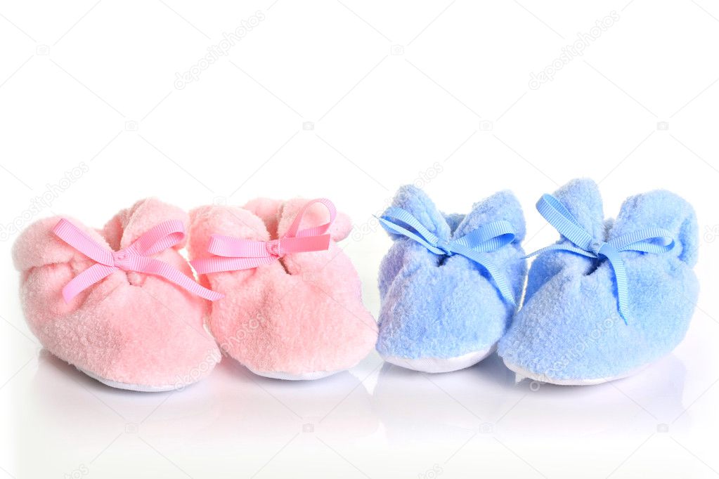 pink and blue baby shoes