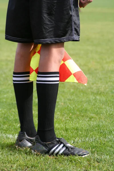 Fútbol linesman piernas — Foto de Stock