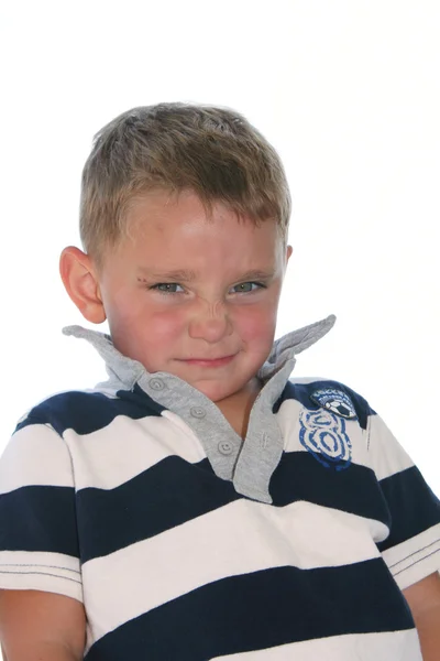 Three year old boy looking angry — Stock Photo, Image