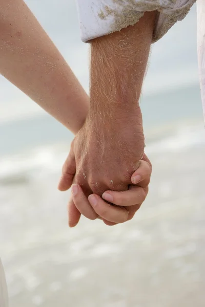 stock image Couple holding hands