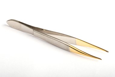 Tweezers with golden tips clipart