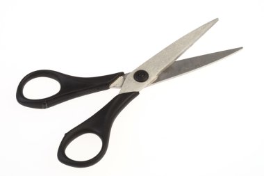 Scissors on white