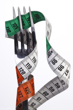Tape measure and fork clipart