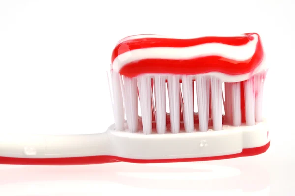 Escova de dentes vermelha e branca — Fotografia de Stock