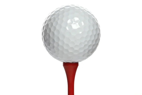 Golfball on white tee — Stock Photo, Image
