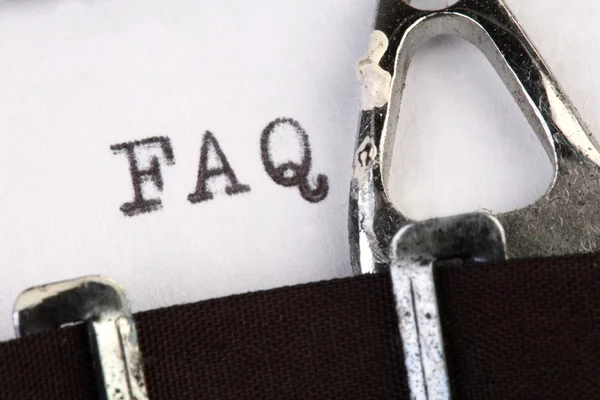 stock image FAQ on old typewriter