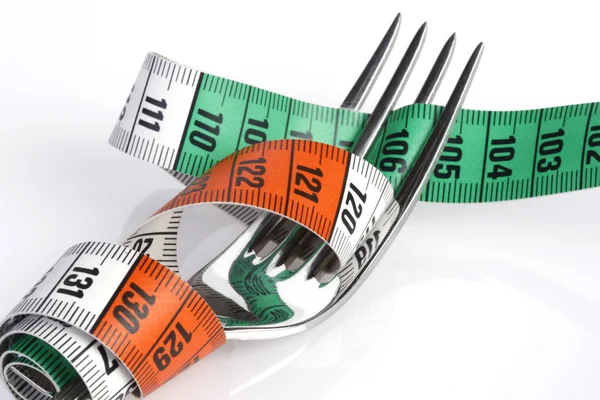 Tape measure and fork — Stock Photo, Image