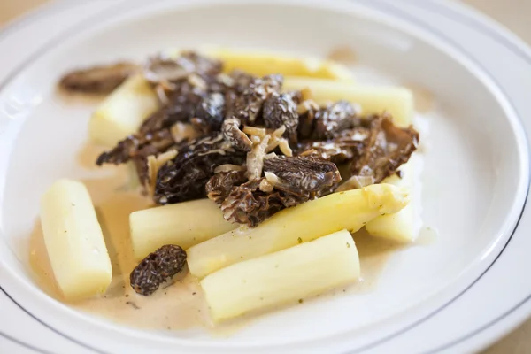 Asparagus with morels Stock Picture