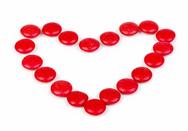 Stock image Heart of red glazed candies