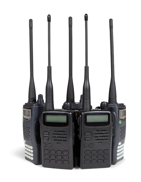 Five portable radio sets. Isolated on white. — Stock Photo, Image