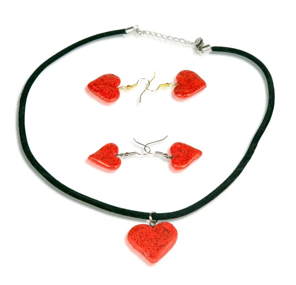 Necklace and earrings in the form of the heart. Isolated on whit — Stock Photo, Image