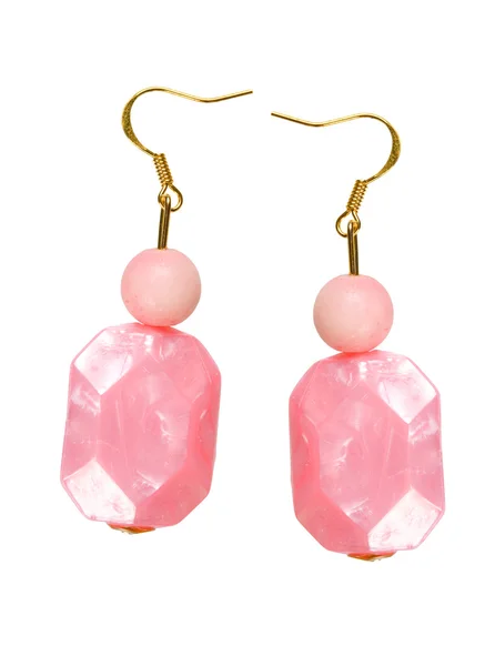 Earrings made of pink plastic on a white background — Stock Photo, Image