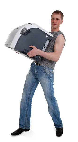 Jonge man met een printer in de handen van — Stockfoto