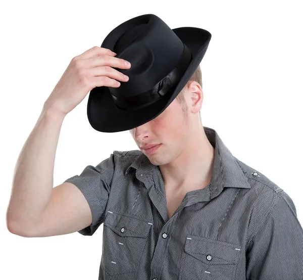 Killen i svart hatt — Stockfoto