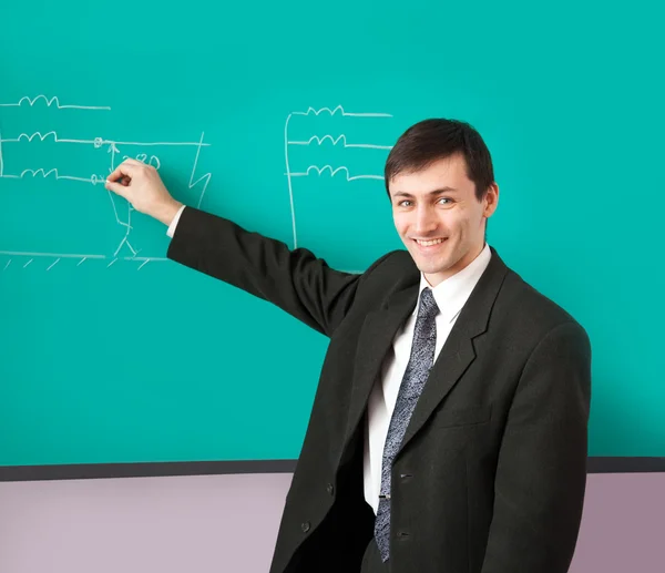 Lärare ger en föreläsning med ett leende — Stockfoto