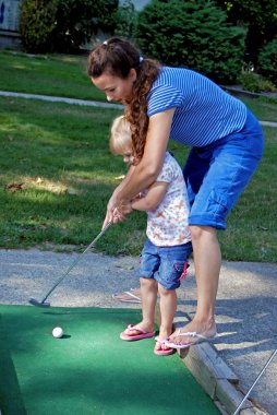 First Golf Lesson clipart