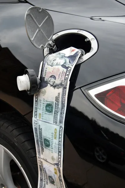 stock image Money in gas tank