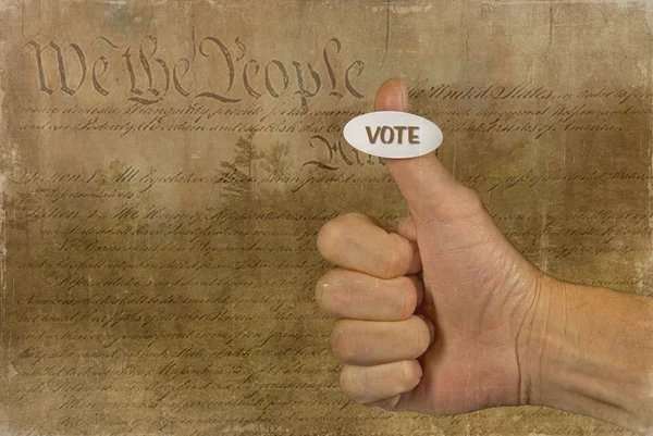 Stemmen sticker op duim — Stockfoto
