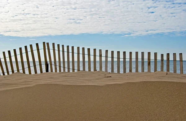 stock image Beach fence with sand drift