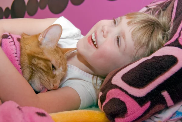 Girl hugging pet cat — Stock Photo, Image