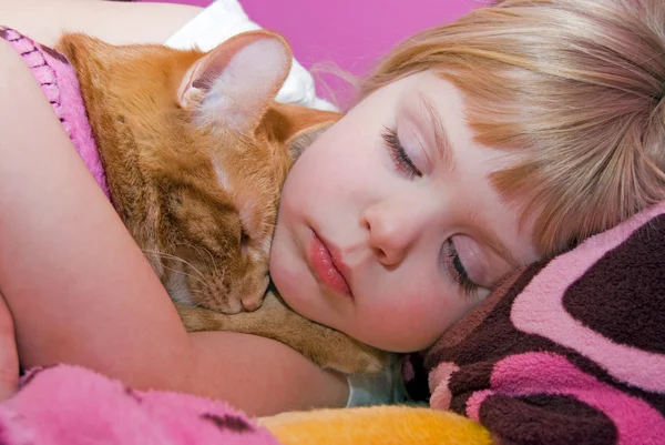 Girl hugging her pet cat — Stock Photo, Image