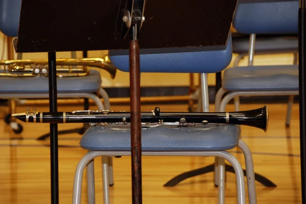 Clarinet on chair — Stock Photo, Image