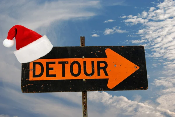 Santa's hat on detour sign — Stock Photo, Image