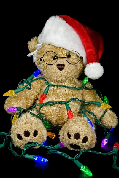 Teddy bear a kusza nyaralás fények — Stock Fotó