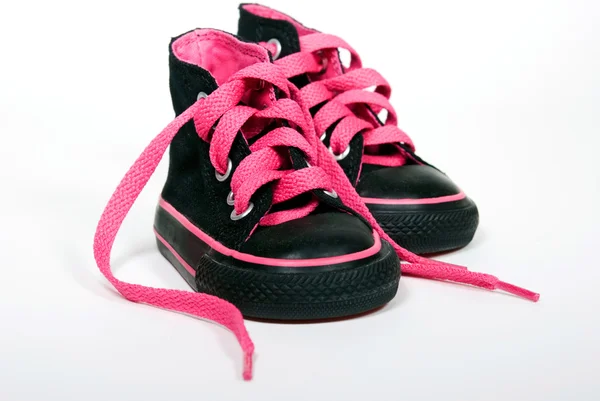 Pink shoelace in sneakers — Stock Photo, Image
