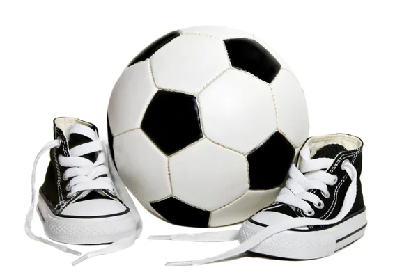 Sapatilha com bola de futebol — Fotografia de Stock