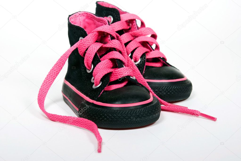 Pink shoelace in sneakers — Stock Photo © jentara #11377448