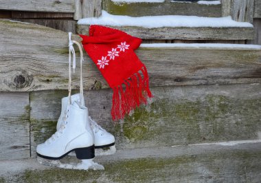 Ice skates with scarf clipart