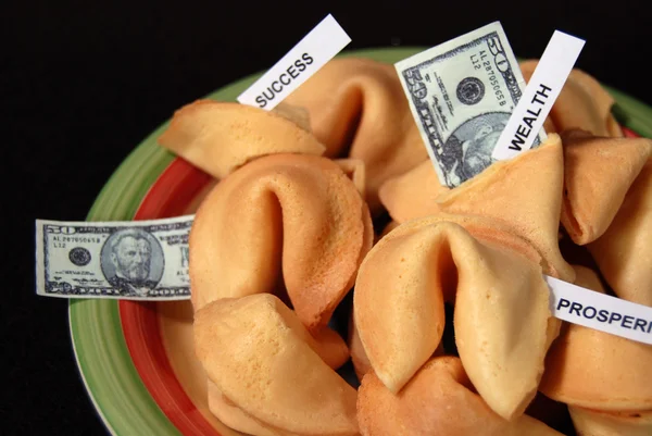 Money in fortune cookies — Stock Photo, Image