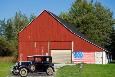 Vintage car by old barn clipart