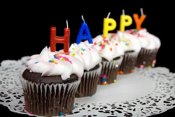 Candele di compleanno su cupcake — Foto Stock