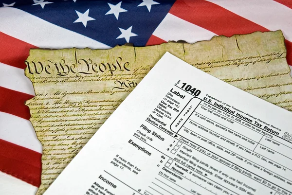 Tax form on flag — Stock Photo, Image