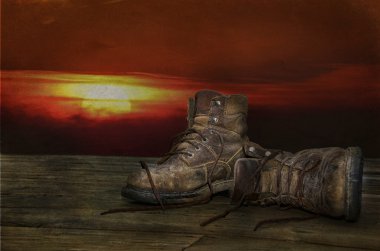 Worn out work boots clipart