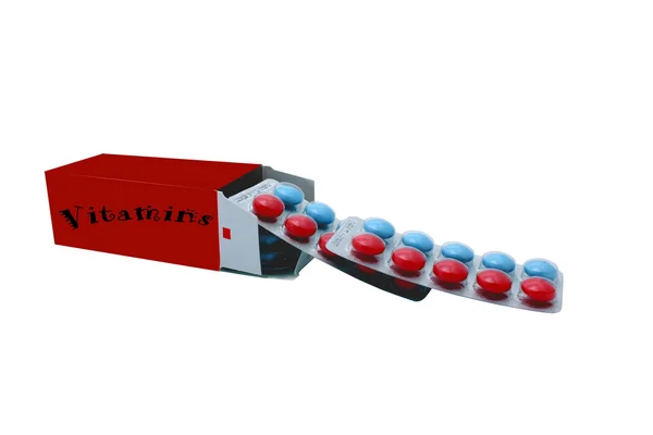 Pílulas de vitaminas em um fundo branco Imagem De Stock