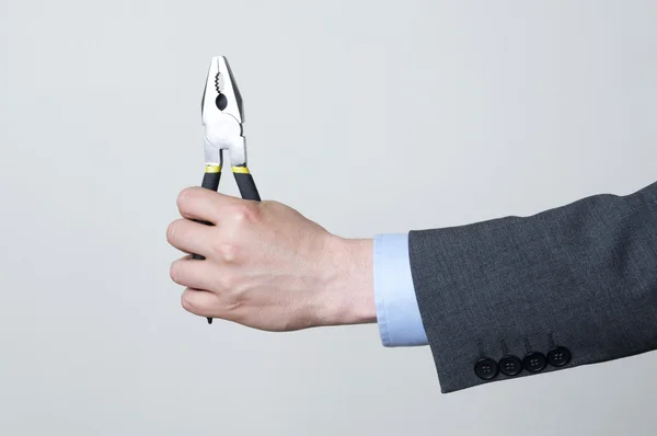 Holding a tool — Stock Photo, Image