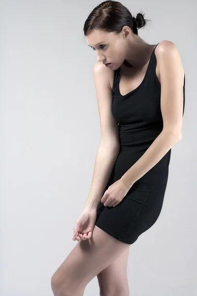 Woman in little black dress — Stock Photo, Image