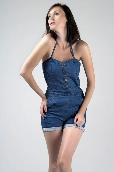 Woman in denim outfit — Stock Photo, Image